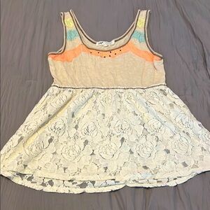 Gently used top from Buckle. Vintage. Comfortable flowy fit. Size Medium